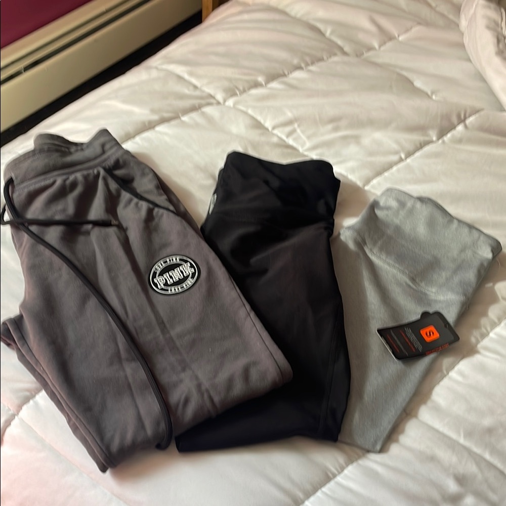 Pink, RBX lot Sweatpants with Logo Patch . One pair has tags. Nice lot.